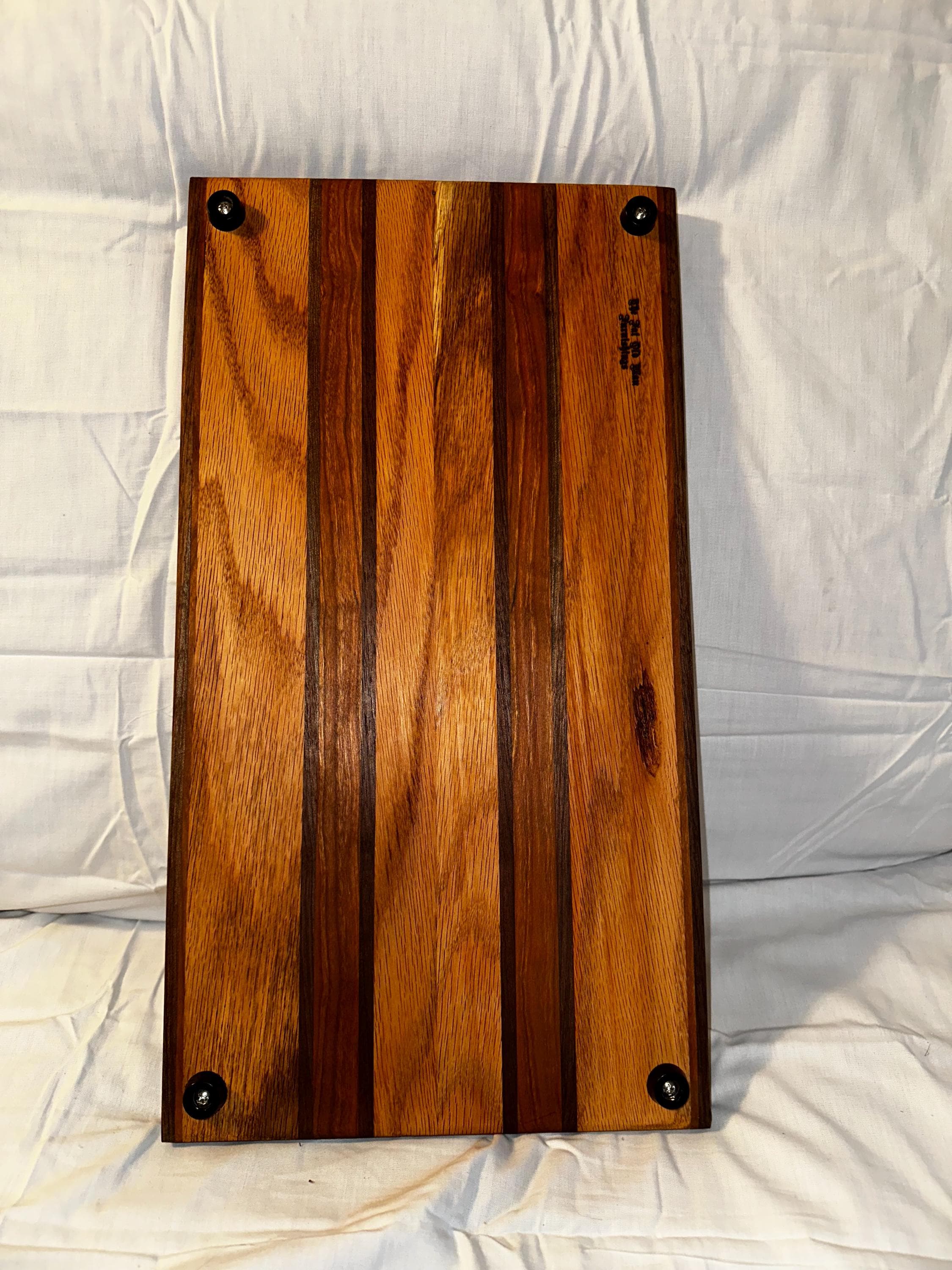 Cutting board made from reclaimed wood. Cherry, Oak and Walnut.