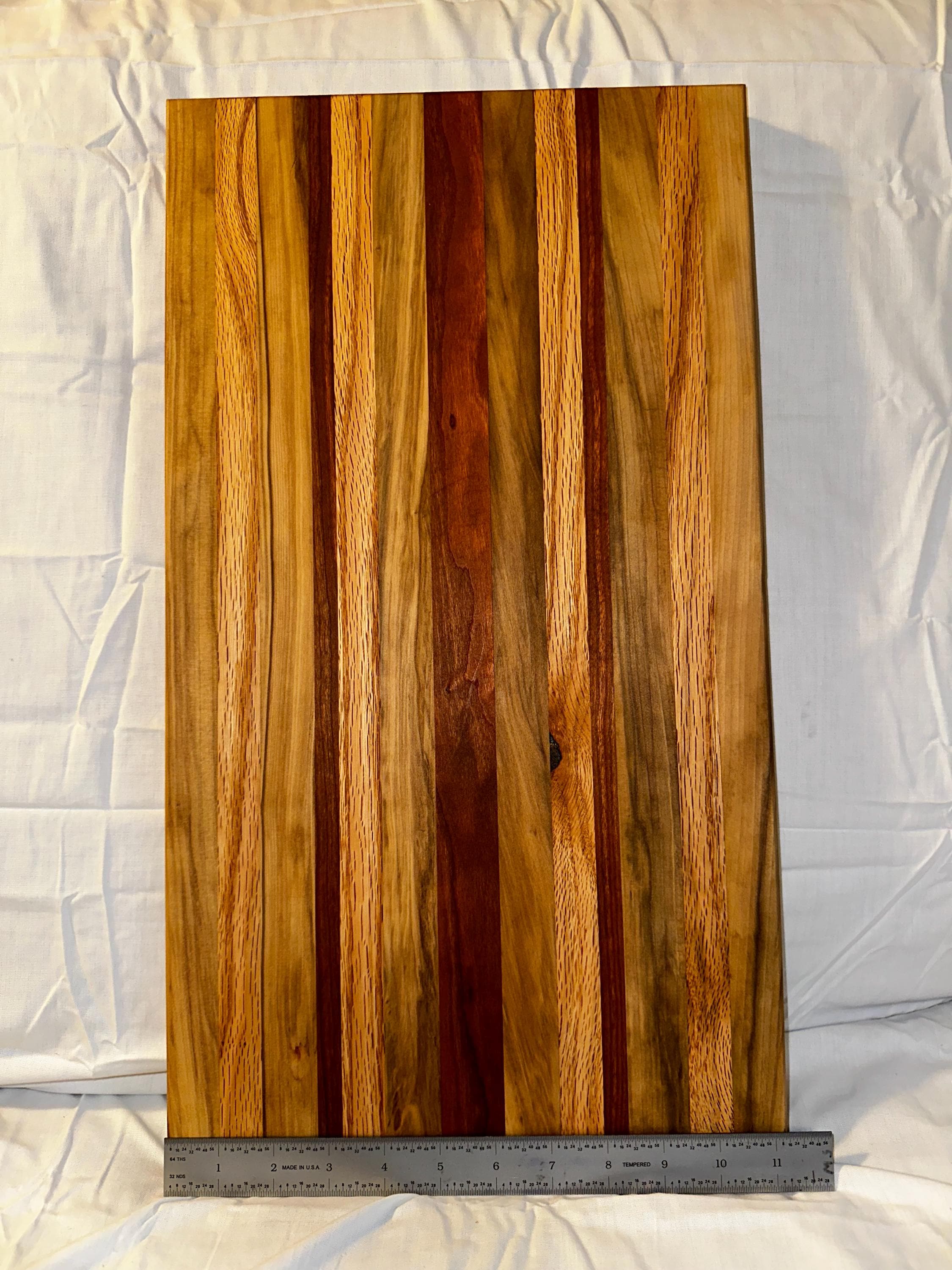 Cutting board made from reclaimed wood. Cherry, Black gum, and Oak