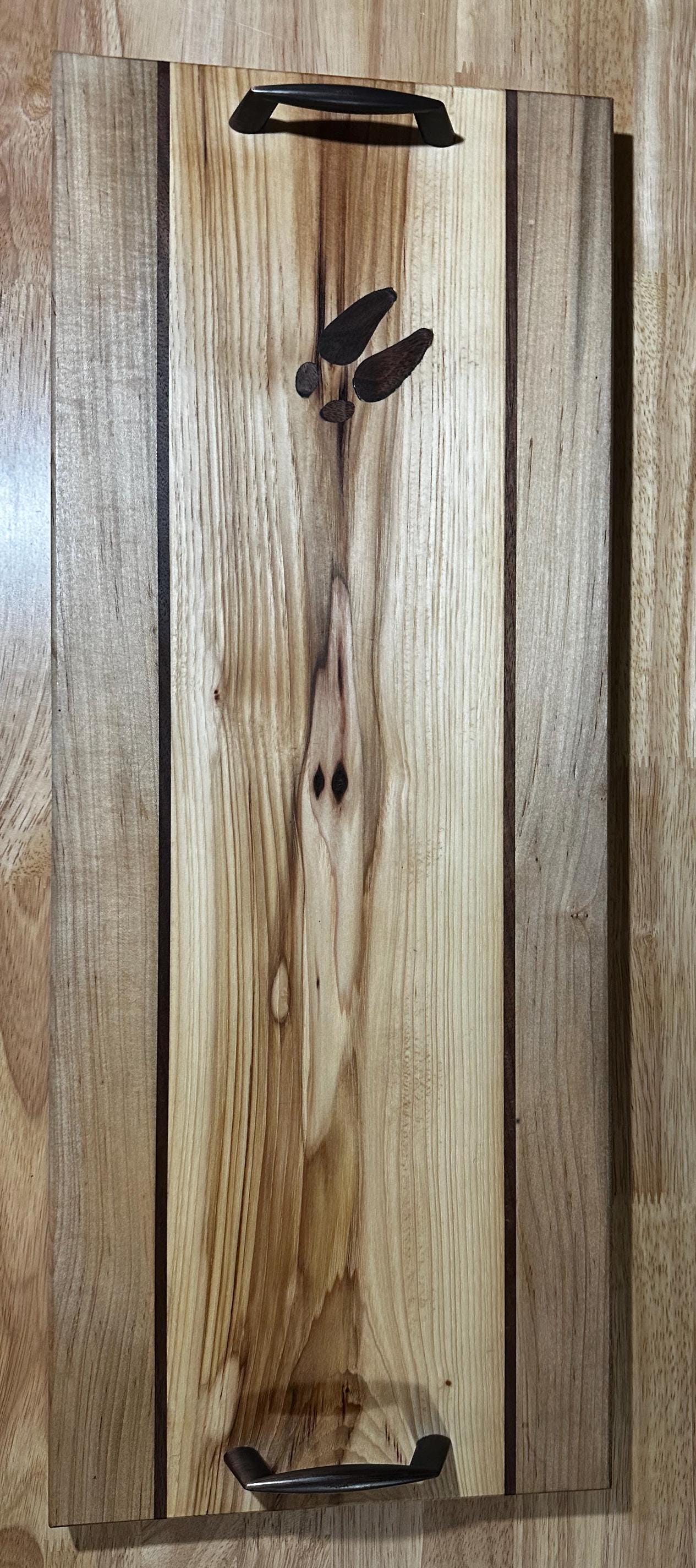 Deer hoof inlaid charcuterie board. Made from mostly reclaimed wood.