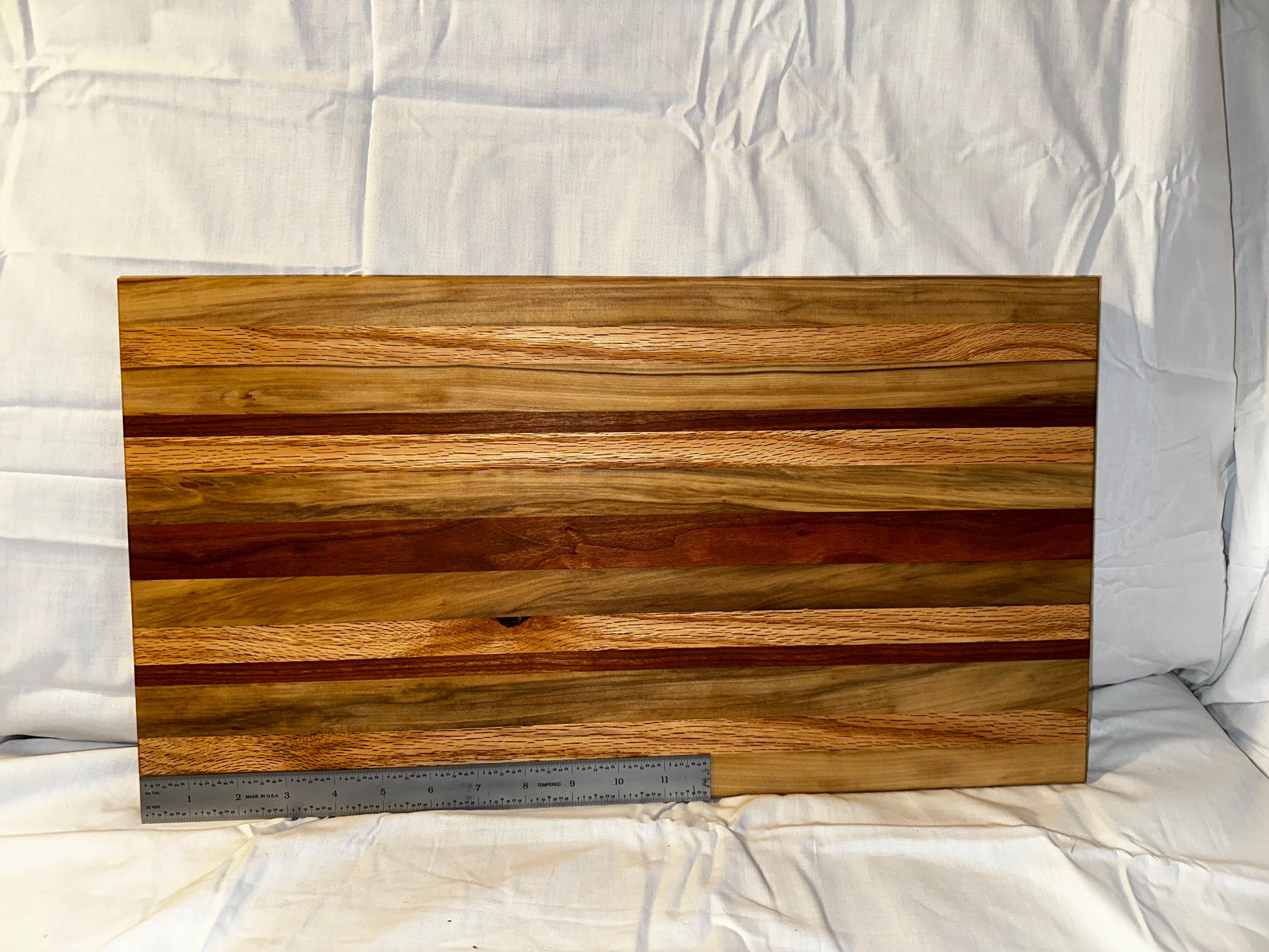 Cutting board made from reclaimed wood. Cherry, Black gum, and Oak